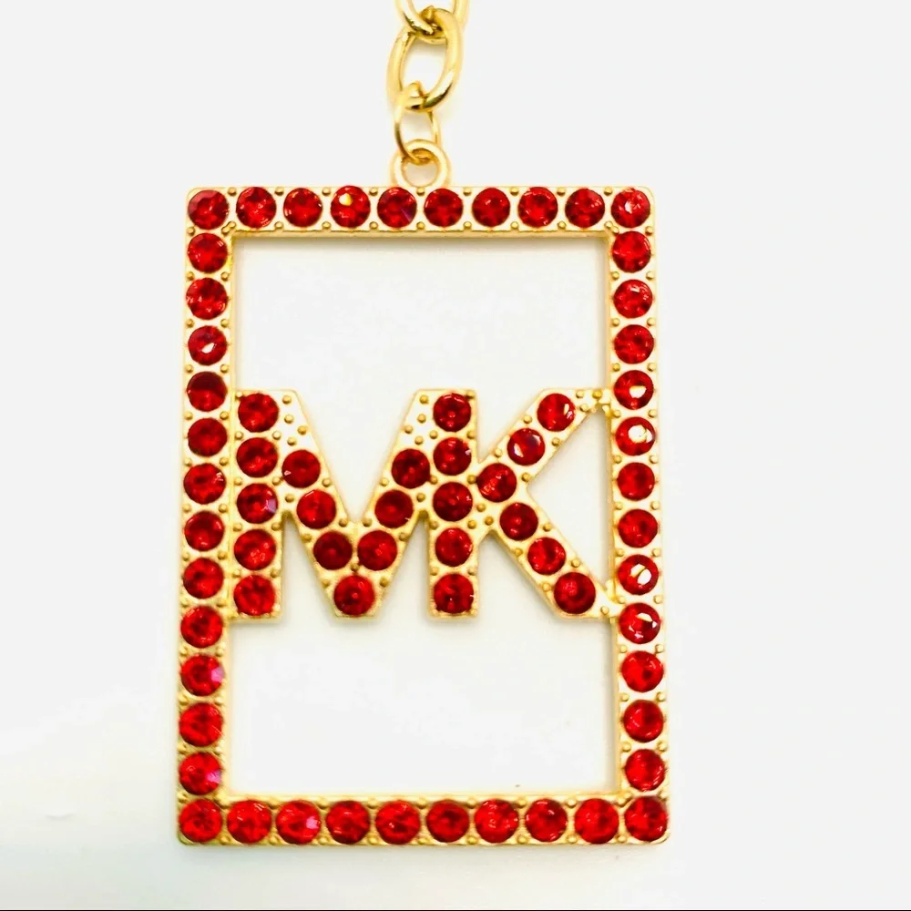 Purse Charm Key Chain MK in Red Crystals set in golden tone.